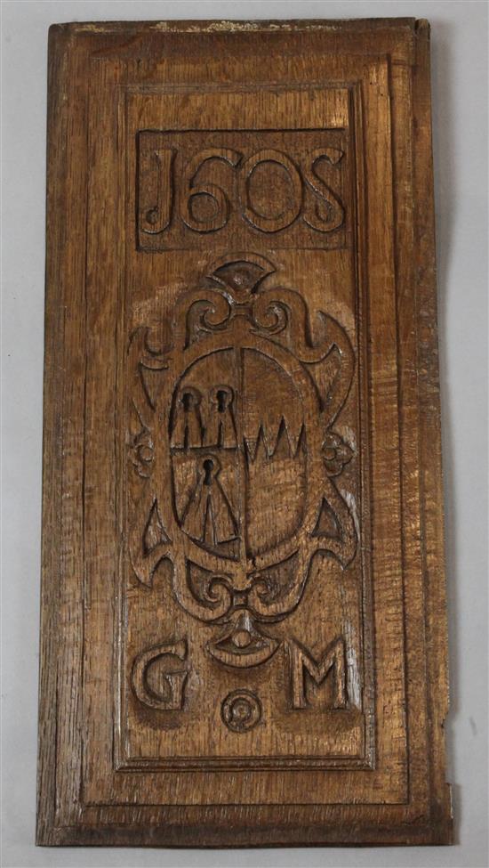An armorial panel dated 1605, monogrammed G.M. 23.5 x 10.5in.